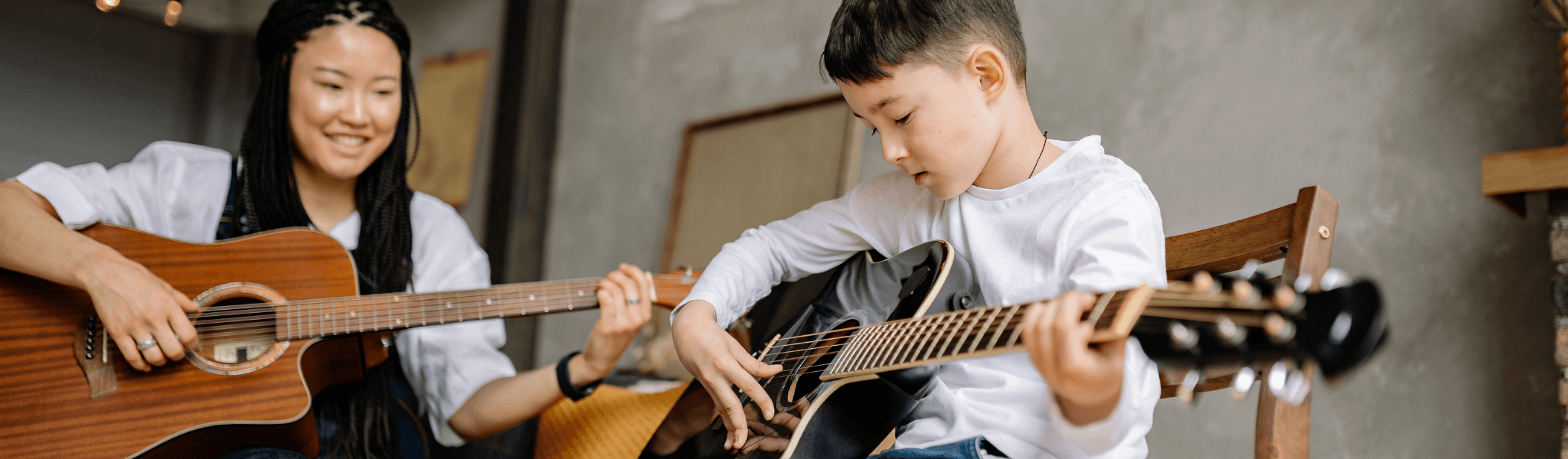 A music teacher with a young student