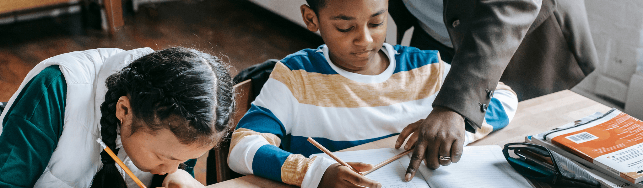 A tutor working one on one with a child