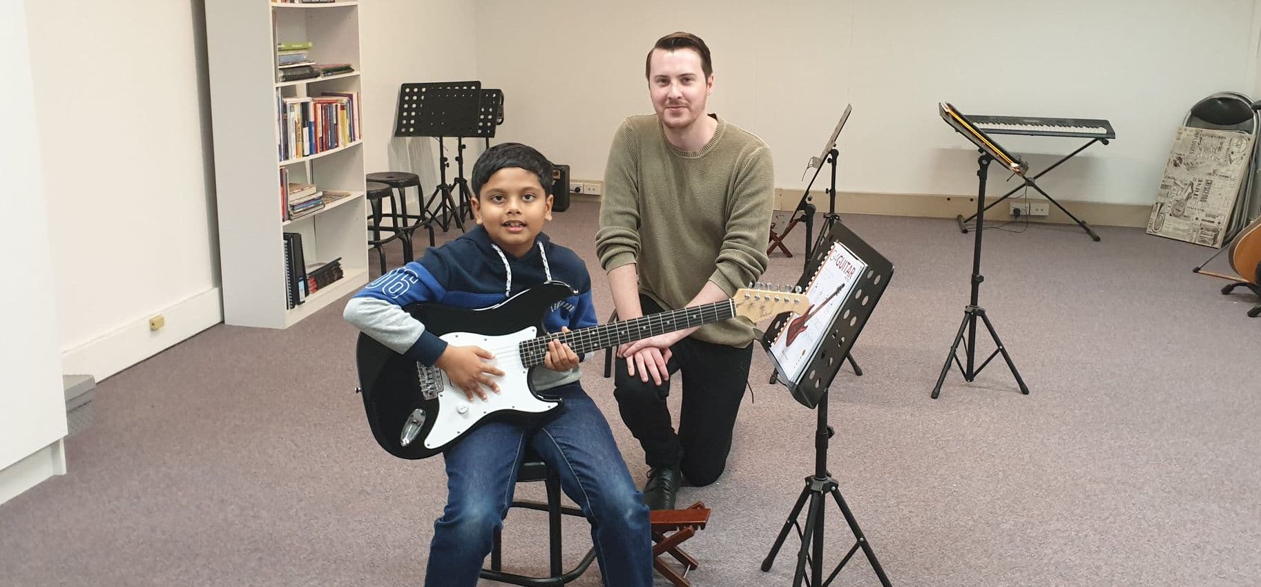 G4 Guitar Parramatta Logo on Kidsbook