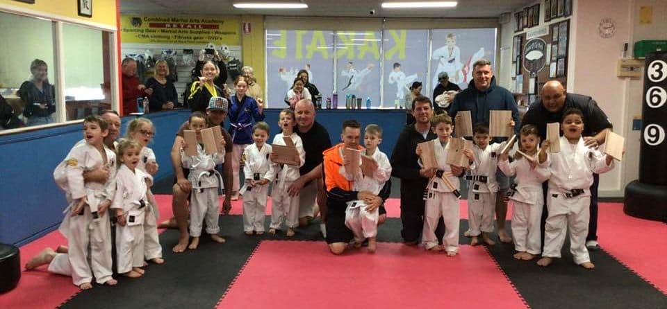 Combined Martial Arts Academy Logo on Kidsbook