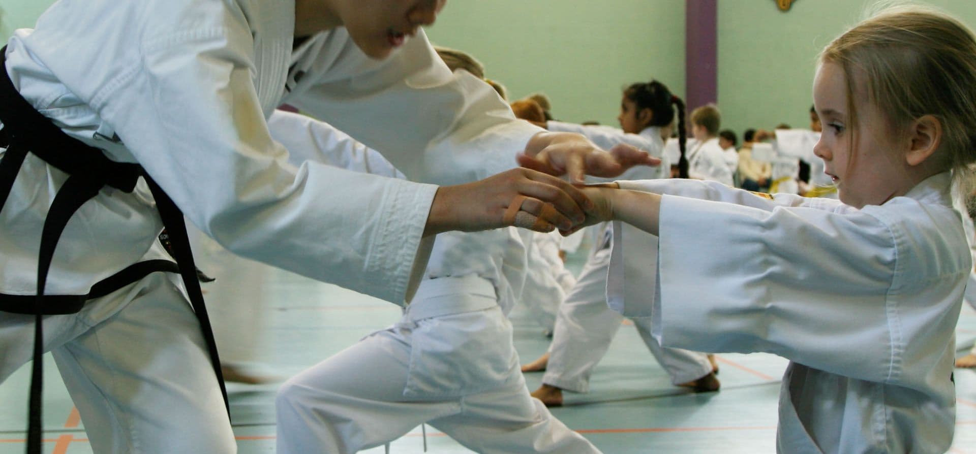 Rhee TaeKwon-Do Nundah Logo on Kidsbook
