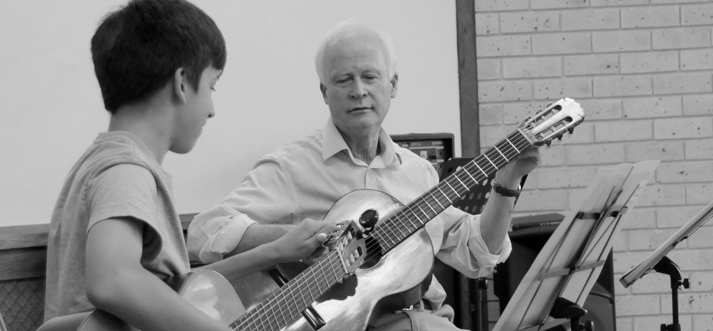 Ken Burns Guitar Logo on Kidsbook