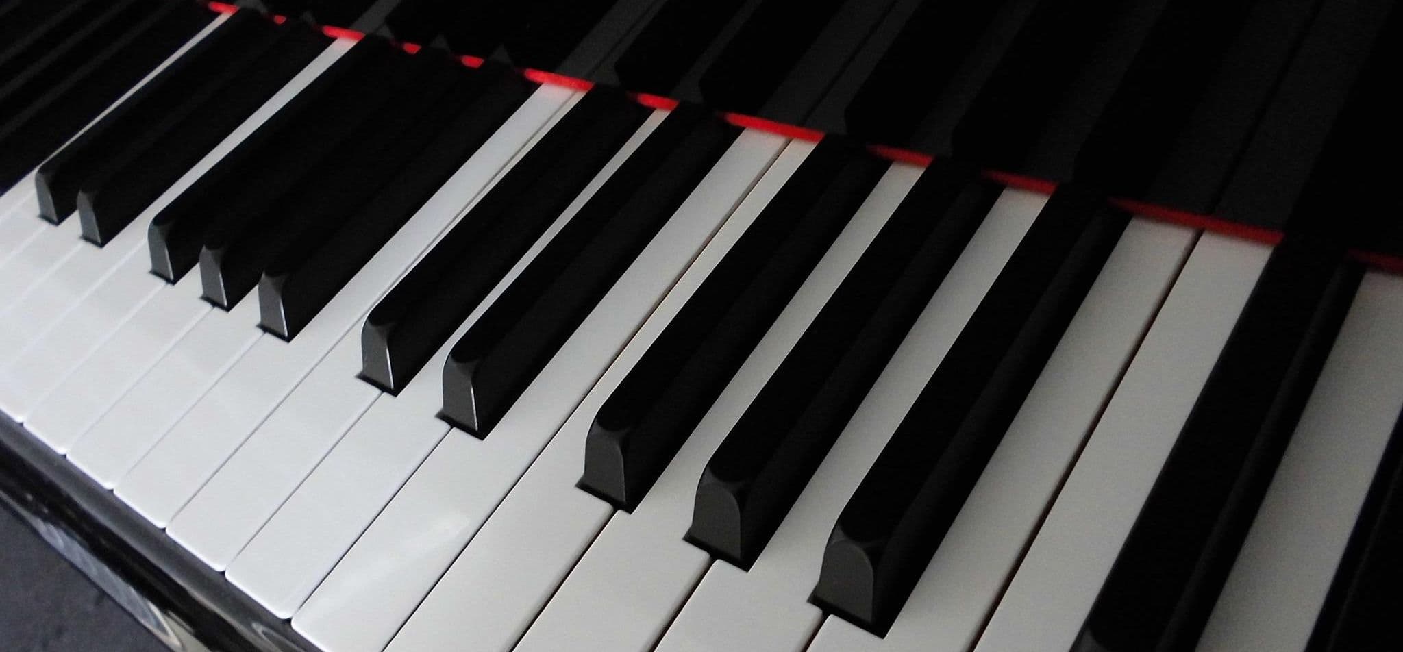 Piano Lessons with Rebecca Logo on Kidsbook