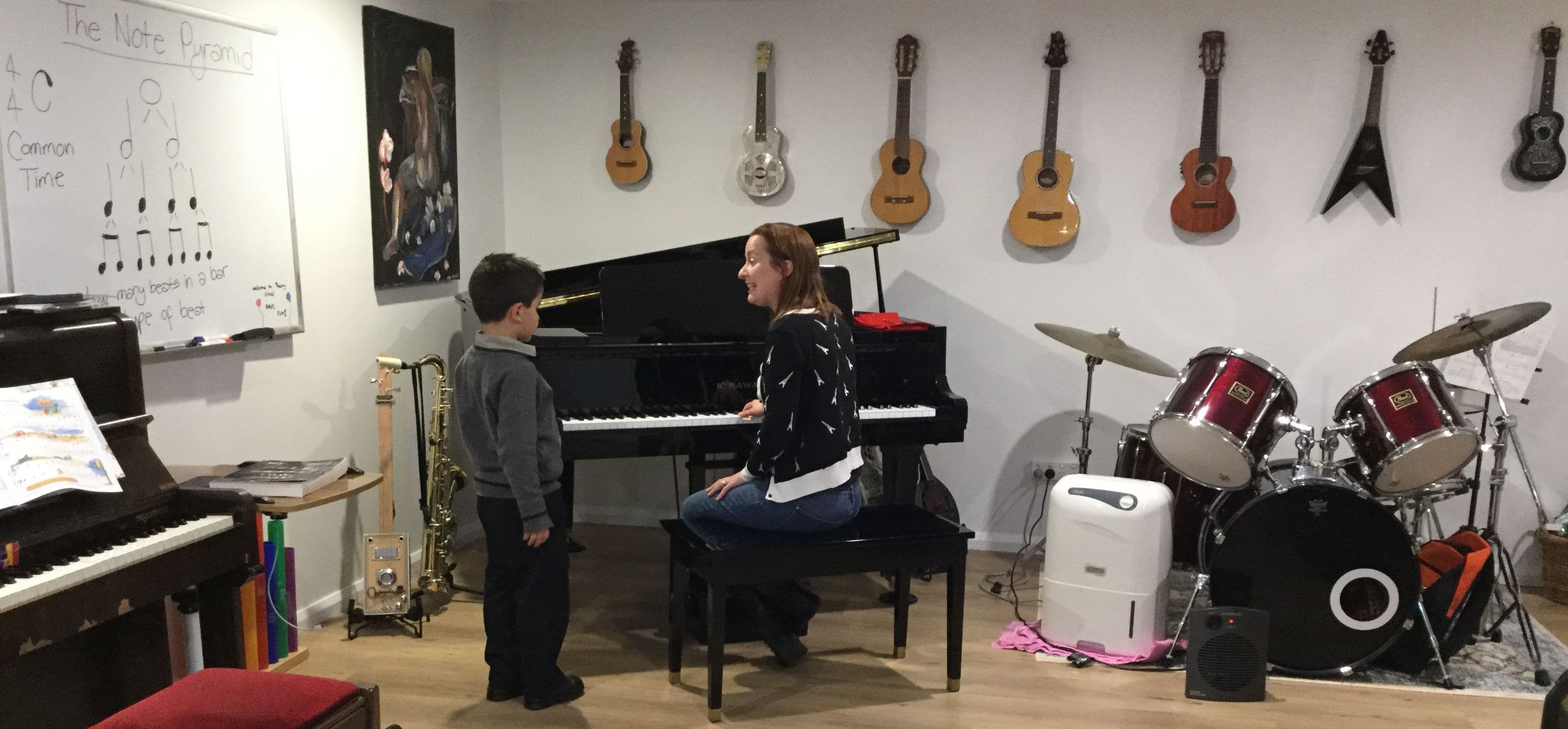 Piano lessons with Victoria Smith Logo on Kidsbook
