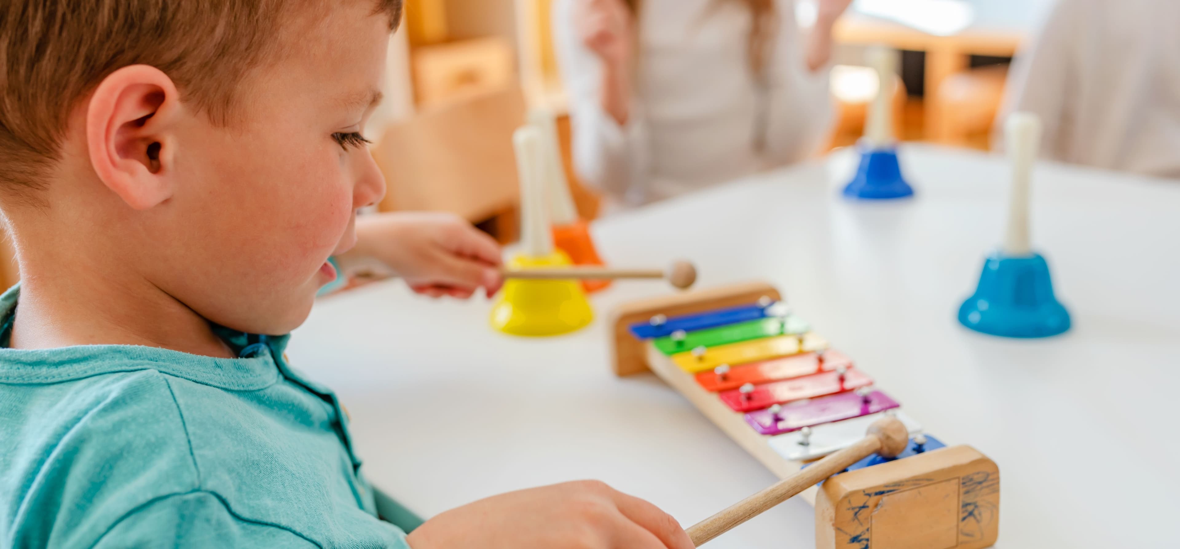 Guitar Lessons & Early Childhood Music with Ky Fisher Logo on Kidsbook