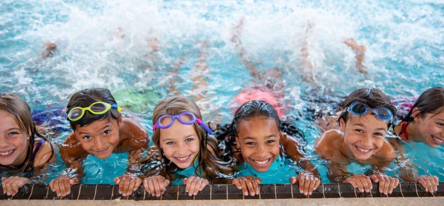 New Wave Swim Centre Logo on Kidsbook